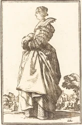 Femme noble de profil avec les mains dans un manchon