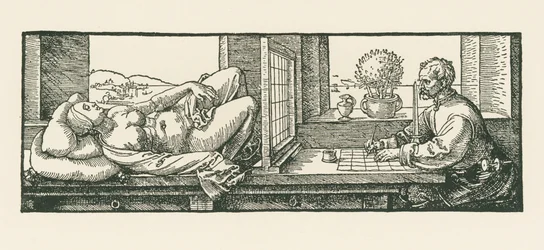 Un homme dessine une femme couchée