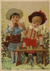 Garçons faisant des tartes de boue