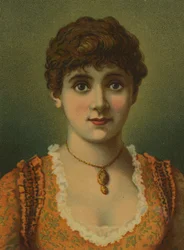 Belle femme, portant un pendentif, avec de grands yeux bleus