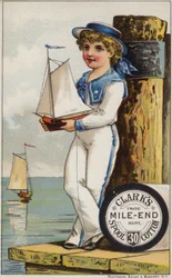 Garçon marin avec un yacht