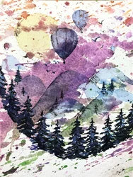 Des ballons colorés dans les montagnes