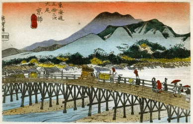 Géographie. Lueur du matin à Nihonbashi (55e station). Gravure sur bois par Hiroshige dans : Cinquante-trois stations du Tokaido (1833-1834). Carte postale, Japon, vers 1900