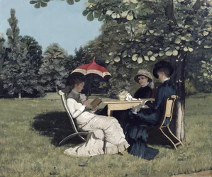 Femmes autour de la table de jardin