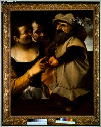 Homme et femme admirant un enfant en costume de mascarade