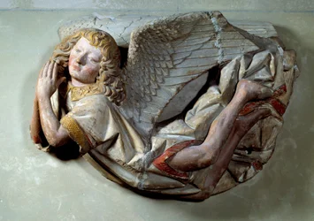 Ange volant Relief en calcaire polychrome attribué à Antoine le Moiturier (1425-1495) et destiné à « La Mise au tombeau offerte par Jaquotin Ogier et sa femme Pernette ». Chapelles des Carmes à Semur-en-Auxois. Vers 1490