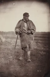Homme avec une canne