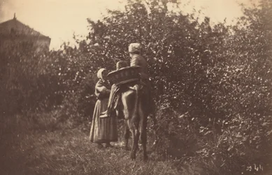 Deux femmes avec un âne