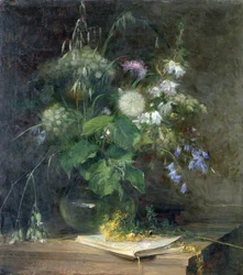 Fleurs sauvages dans un vase en verre