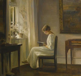 Intérieur avec une femme lisant