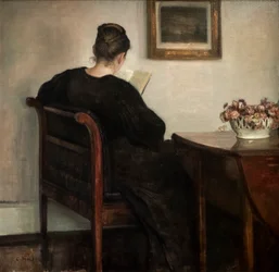 Intérieur, femme lisant