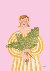 Une femme avec des légumes verts frais