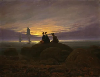 Le lever de la lune au bord de la mer