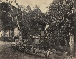 Scène rurale avec bâtiment en pierre et croix, vers 1857