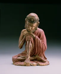 Figure en laque rouge de Sakyamuni, le fondateur de la foi bouddhiste, émergeant des montagnes, Dynastie Yan, 1280-1368