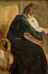 Femme lisant dans un fauteuil