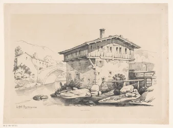 Maison et moulin à eau dans un village de montagne