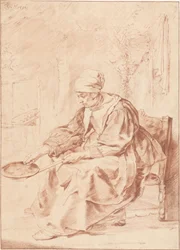 Femme faisant des crêpes