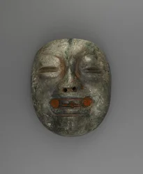 Pendentif en forme de masque