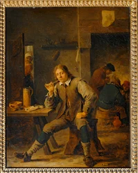 Fumeur accoude à une table ...