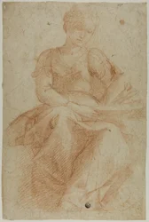 Femme assise avec un livre
