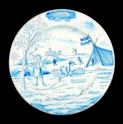 Assiette en faïence de Delft représentant le mois de décembre