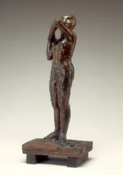 Danseuse ajustant la bretelle de son corsage, 1880-1890