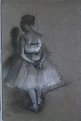 Danseuse debout avec les mains croisées derrière le dos, 1874