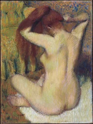 Femme se peignant les cheveux