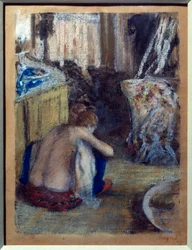 Femme accroupie
