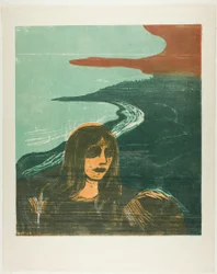 Tête de femme contre le rivage