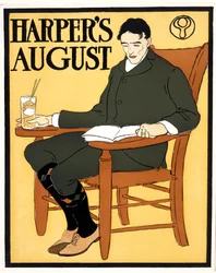 Homme assis sur une chaise orange, chez August Harper