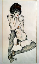 Femme nue assise