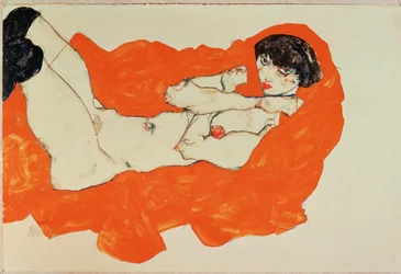 Nu féminin allongé sur un drap rouge