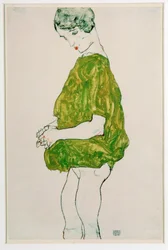 Femme, debout, les mains jointes
