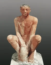 Civilisation égyptienne, statue en calcaire peint représentant un homme modelant de l