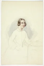 Jeune femme à un bureau d