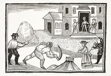 Un homme fauchant de l