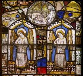 Un panneau dans la fenêtre est représentant deux anges et le lion de Saint Marc