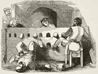 Prisonniers enfermés dans les entraves, de 