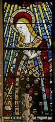 La fenêtre est (Ew) représentant la Vierge Marie (figure composite) - avec des bijoux de verre incrusté