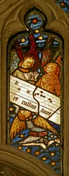 Fenêtre n2 représentant la chorale angélique avec une partition musicale