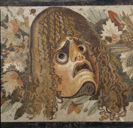 Feston de masques, de feuilles et de fruits