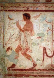Art étrusque : fresques représentant des scènes de banquet, détail représentant un joueur de flûte. Tombe des Tricliniums. Ve siècle av. J.-C. Musée archéologique national de Tarquinia, Italie