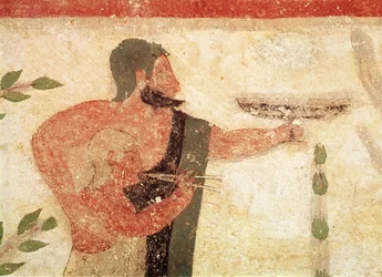 Homme et enfant jouant de la double flûte (détail)