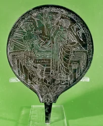 Miroir représentant Aphrodite persuadant Hélène de suivre Paris à Troie, de Palestrina