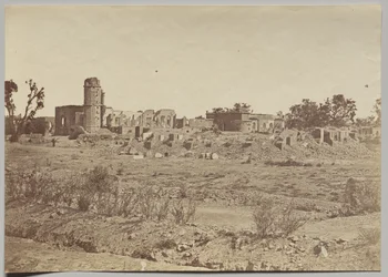 Le cimetière et la résidence au loin