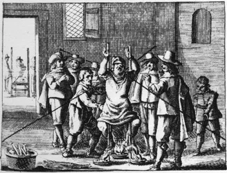 Sorcier torturé avec un collier - Gravure de 1725 dans « La Sorcellerie démasquée » par Abraham Palingh