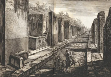 Vue de la rue entrant sous la porte de la ville de Pompéi