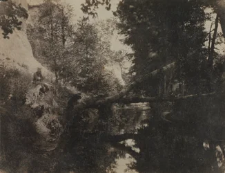 Paysage avec figure assise sur la rive du ruisseau